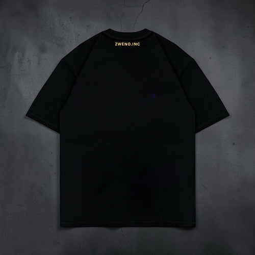 Back view of a black ZWENO.INC cotton crew neck t-shirt featuring subtle gold branding at the nape of the neck.
